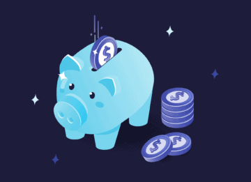 A piggy bank with a stack of coins next to it, denoting the importance of the cost of cloud computing